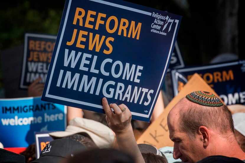 Members of the Jewish community and their supporters hold a "Jews Say #CloseTheCamps"...