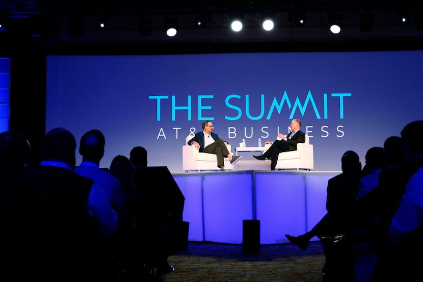 Glenn Hutchins, board member, (left) and John Donovan, CEO of AT&T Communications, have a...