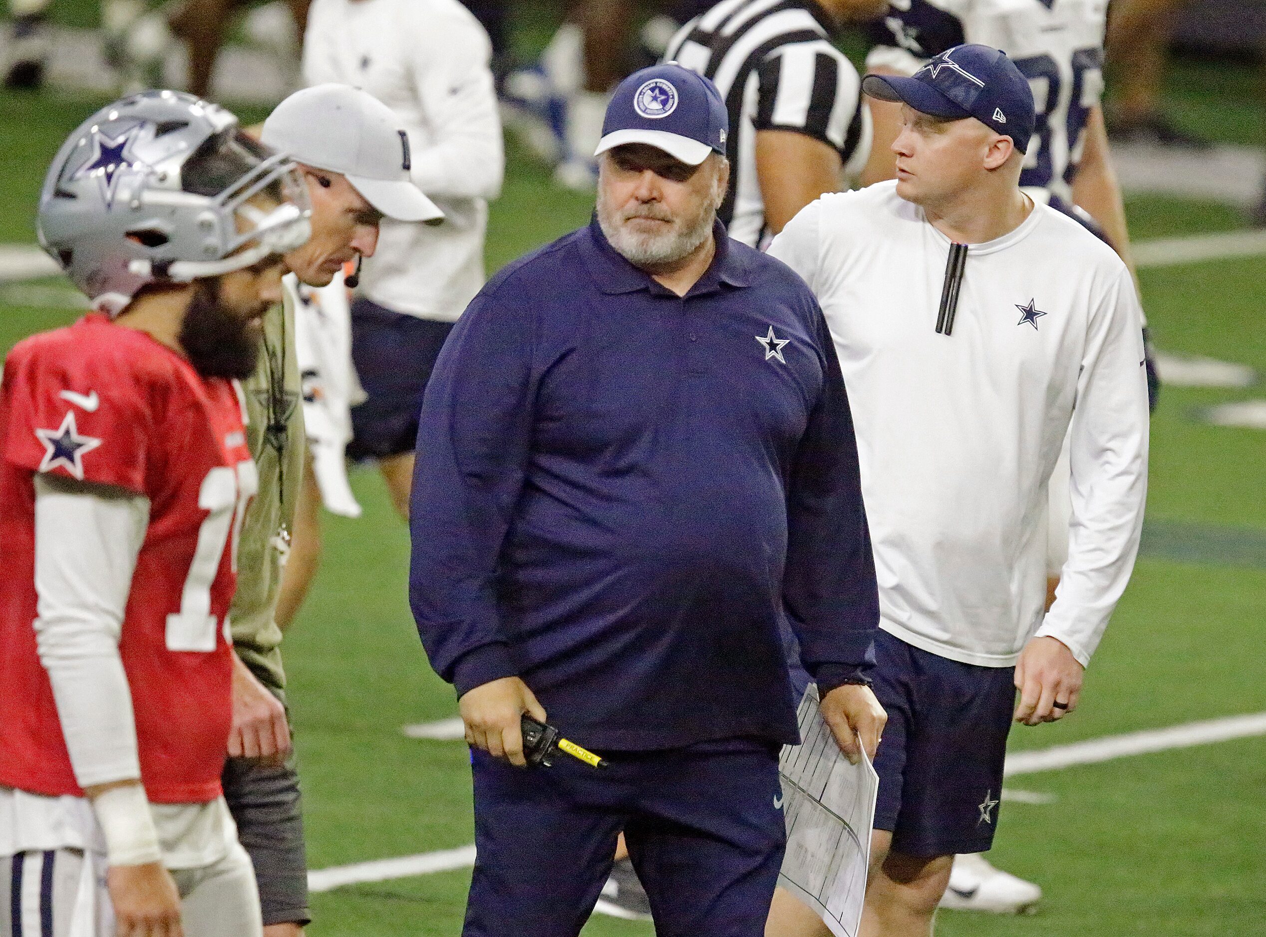 Dallas Cowboys head coach Mike McCarthy walks across the field as the Dallas Cowboys held...