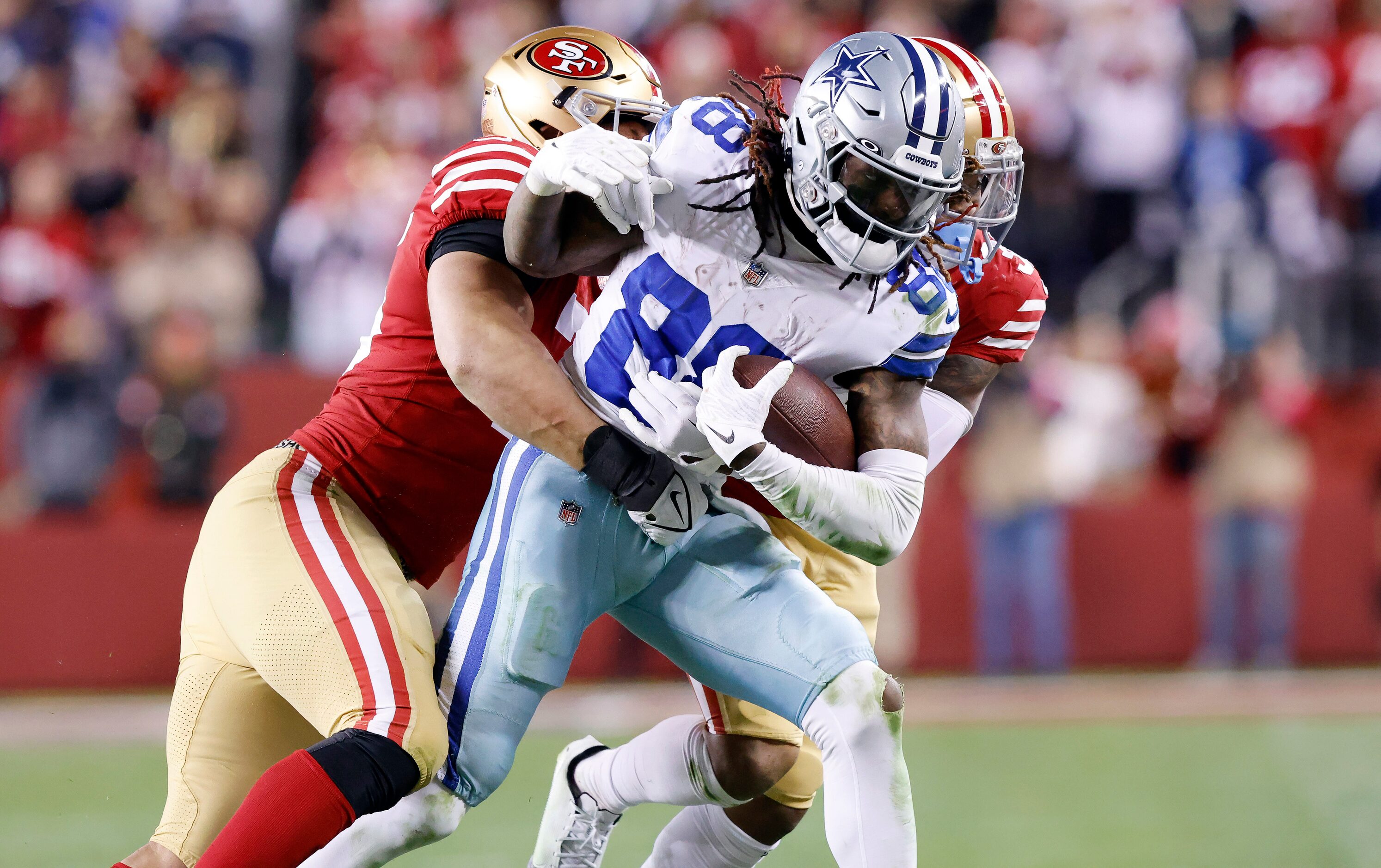 Dallas Cowboys wide receiver CeeDee Lamb (88) is tackled by San Francisco 49ers defensive...