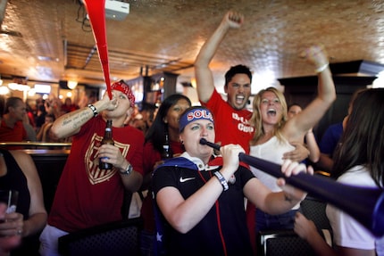 In this DMN file photo, Rachel Patterson (left) and Tracy "Ace" Leverenz blow their trumpets...