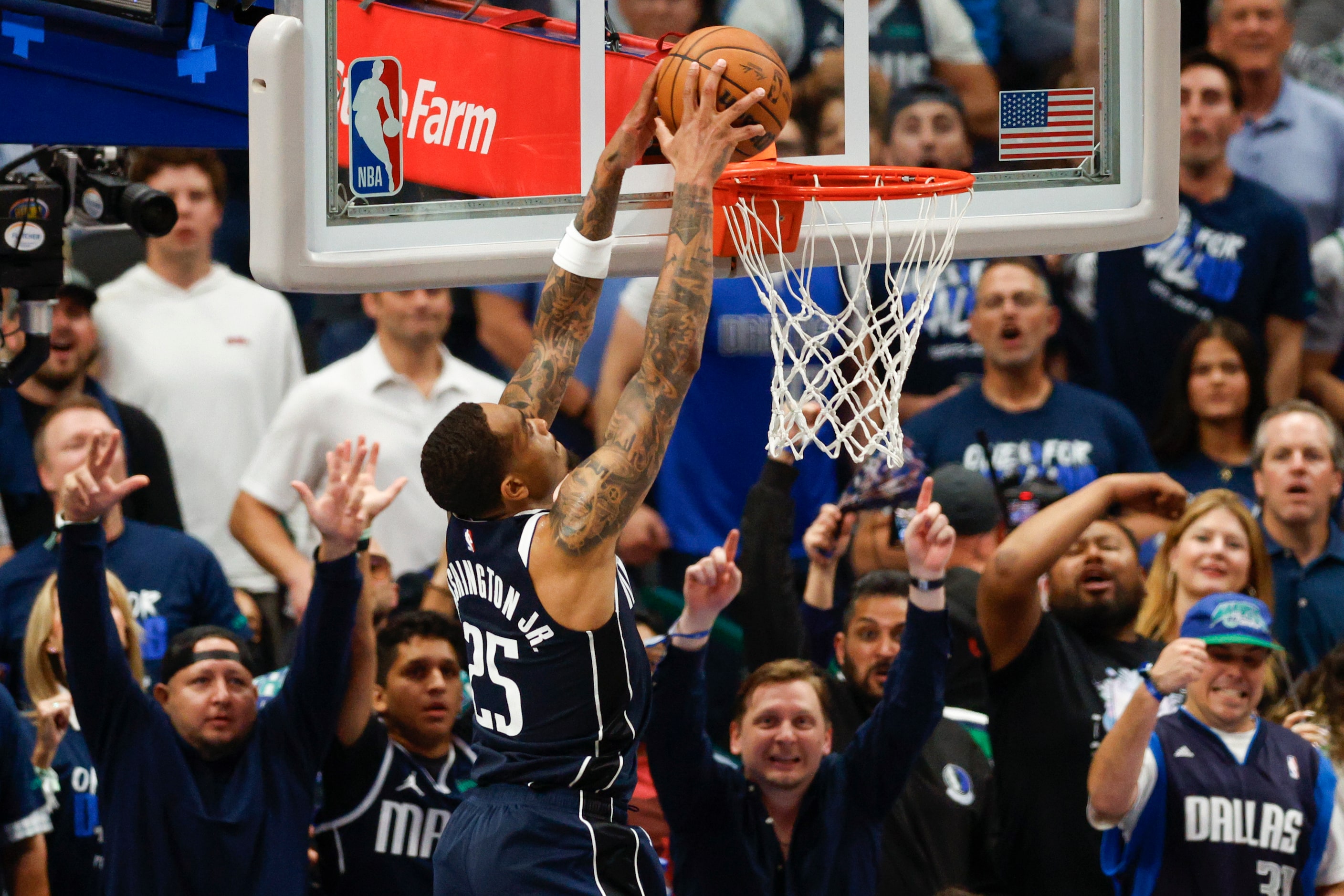 Dallas Mavericks forward P.J. Washington (25) dunks the ball during the second half of Game...