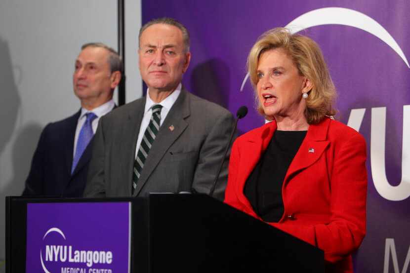  Rep. Carolyn Maloney speaks at a news conference with Sen. Chuck Schumer in announcing she...