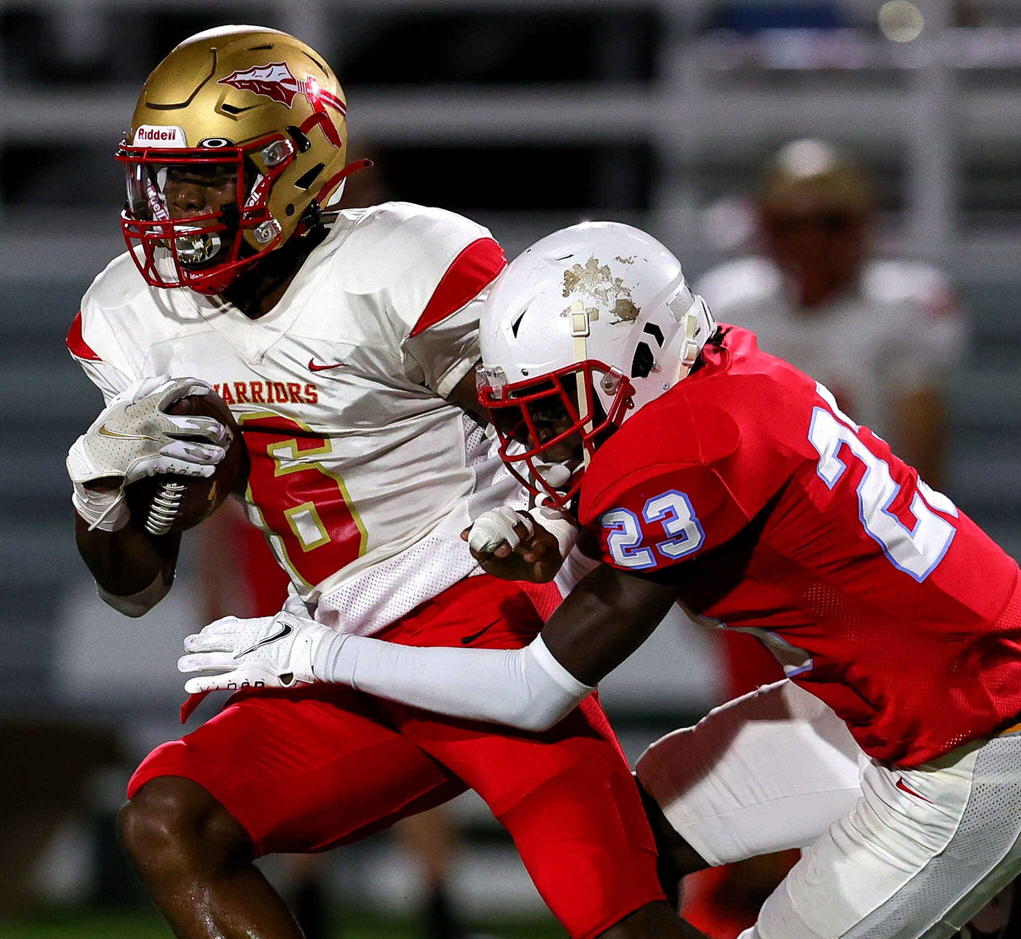 South Grand Prairie running back AJ Newberry (6) fights for yardage against Skyline...