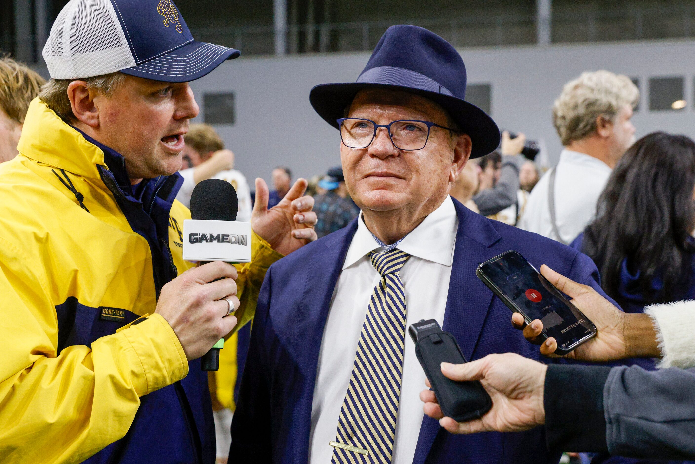 Highland Park head coach Randy Allen listens to a question from a reporter after winning a...