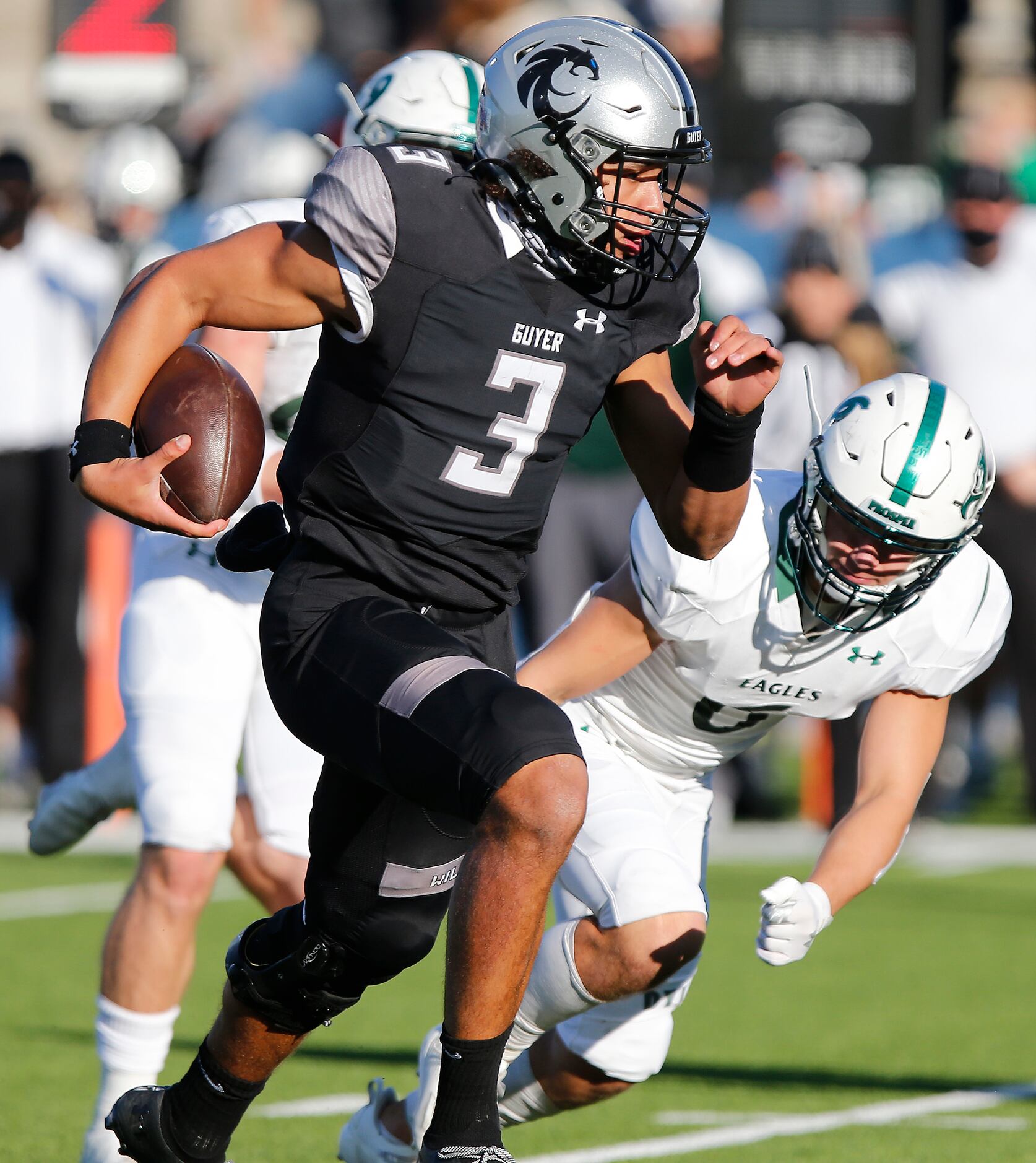 Denton Guyer High School quarterback Eli Stowers (3) races to the end zone during the second...