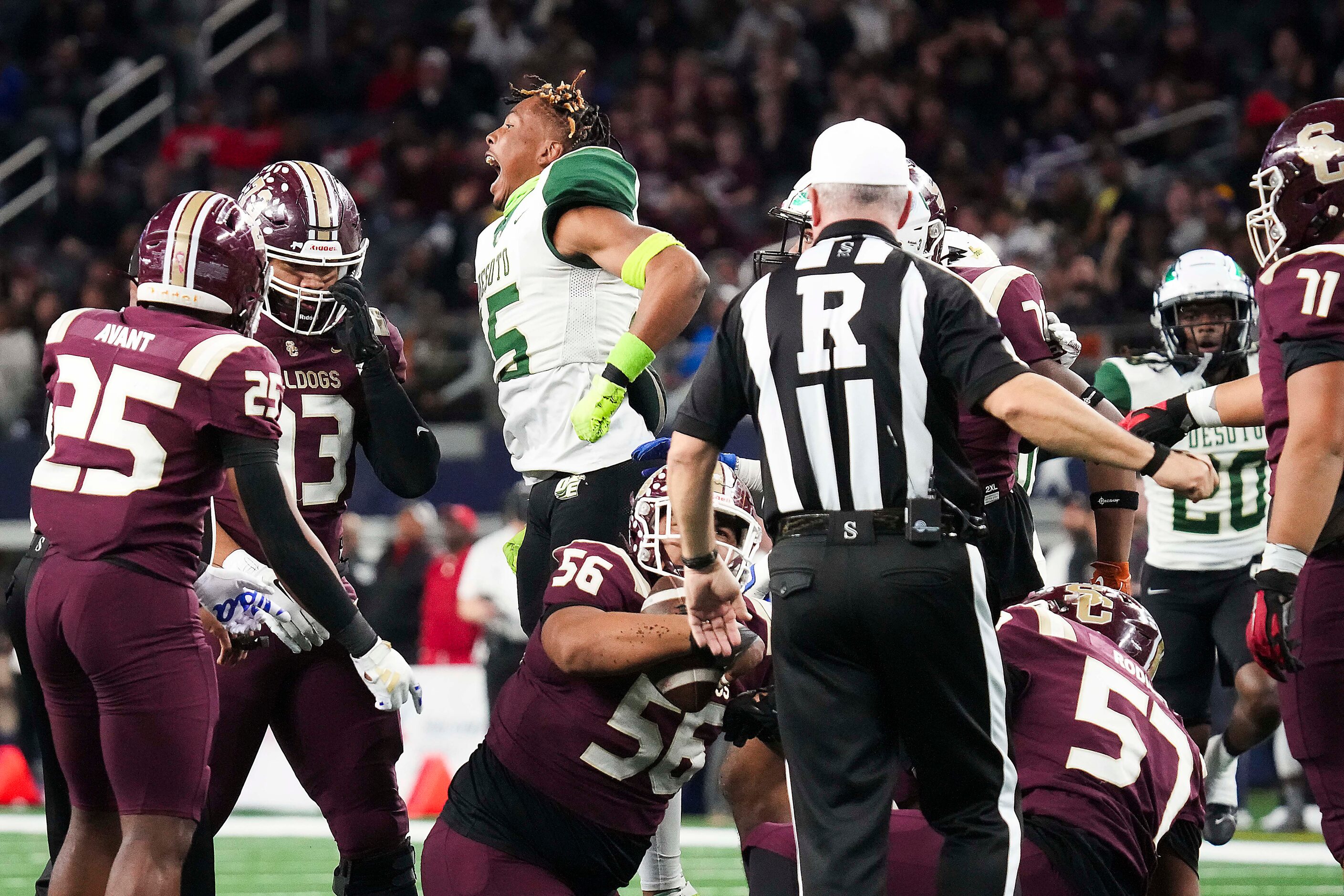 DeSoto defensive lineman Keylan Abrams (15) celebrates after the Eagles intercepted a Humble...