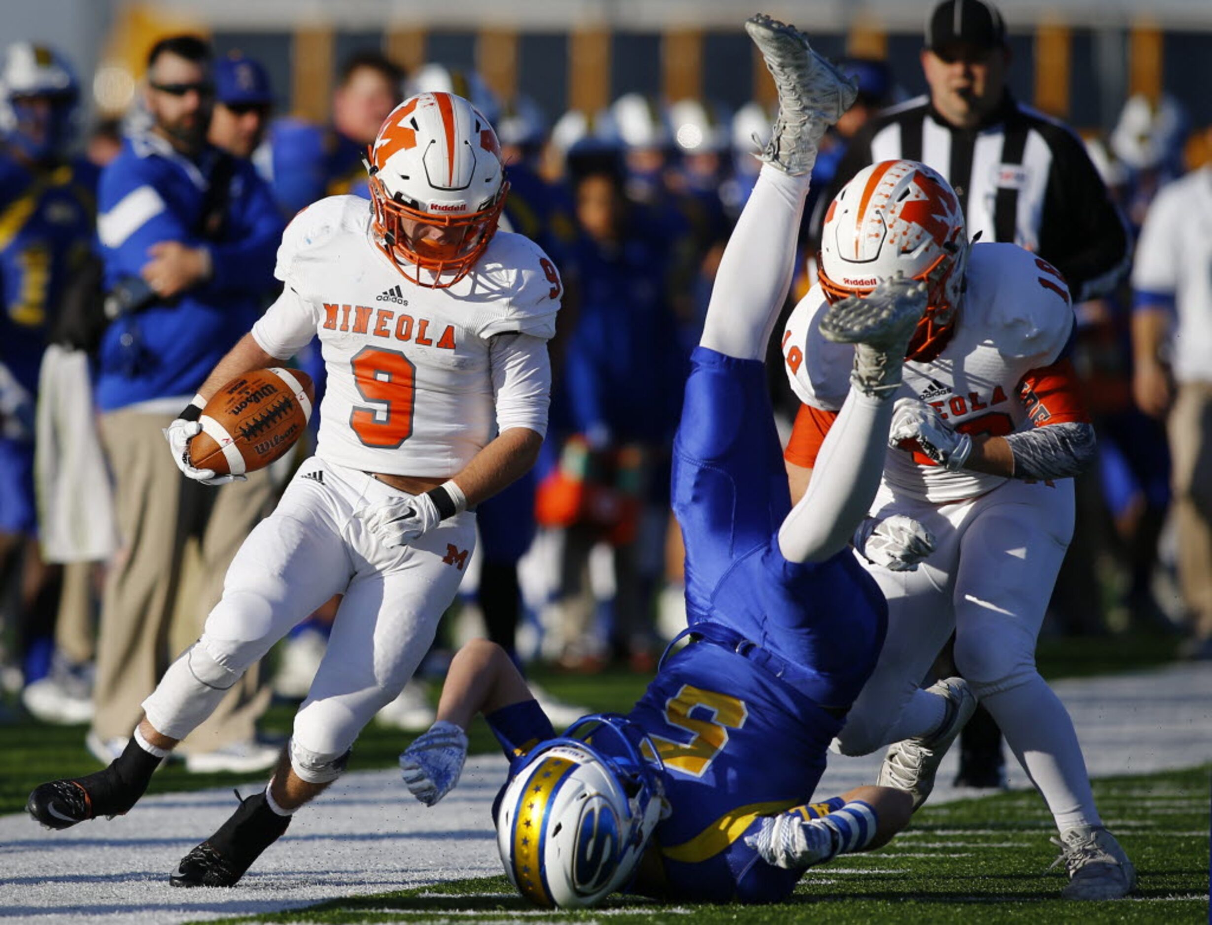 TXHSFB Mineola's Chantz Perkins (9) looks down at Sunnyvale's Cash Goodhart (5) after...