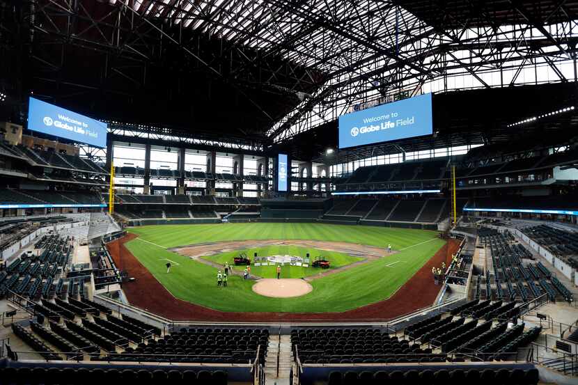 FILE - Artificial turf by Shaw Sports Turf was being installed at the Texas Rangers' Globe...