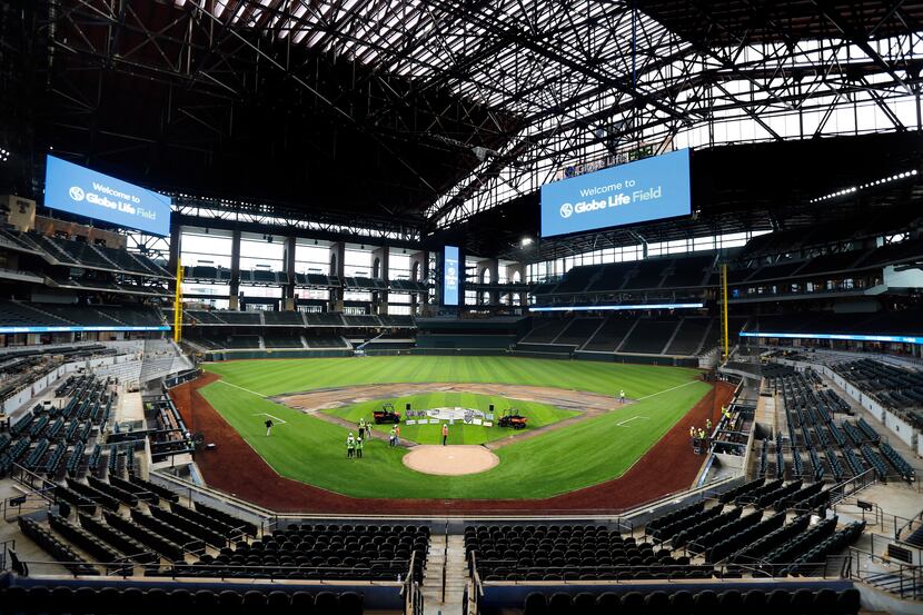 The artificial turf by Shaw Sports Turf is being installed at the new Globe Life Field under...