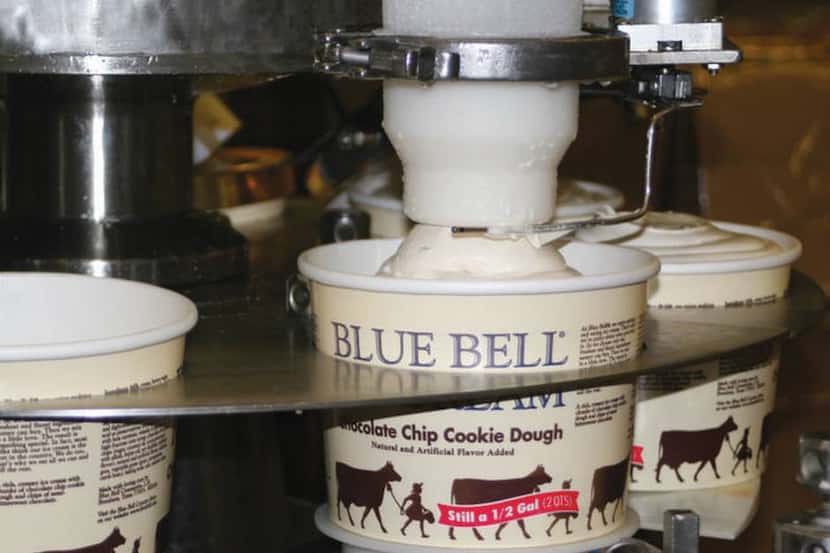 Ice cream is placed into tubs at Blue Bell's plant in Brenham.
