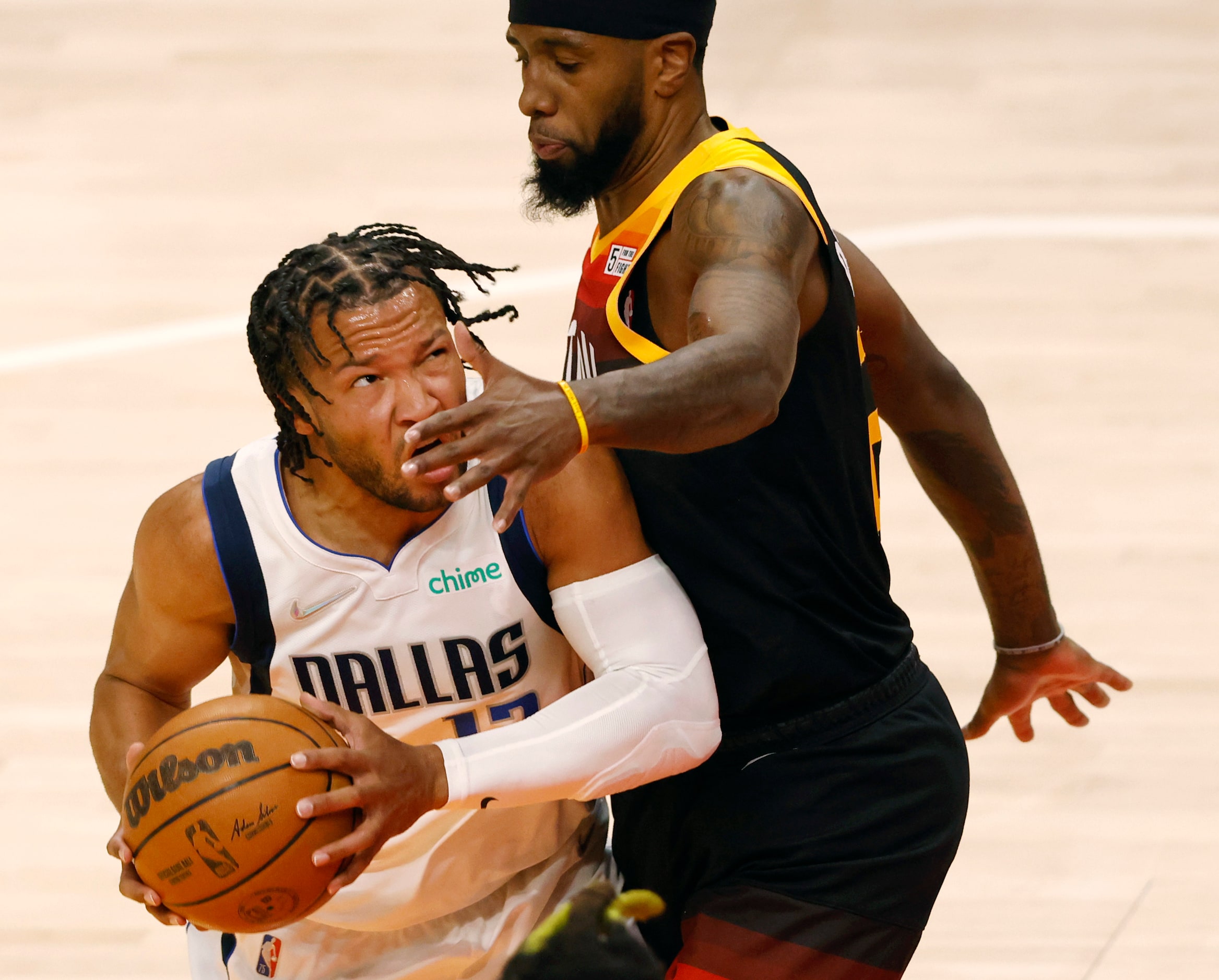 Dallas Mavericks guard Jalen Brunson (13) drives to the basket as Utah Jazz forward Royce...