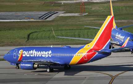 Southwest Airlines planes sit on the tarmac at Fort Lauderdale-Hollywood International...