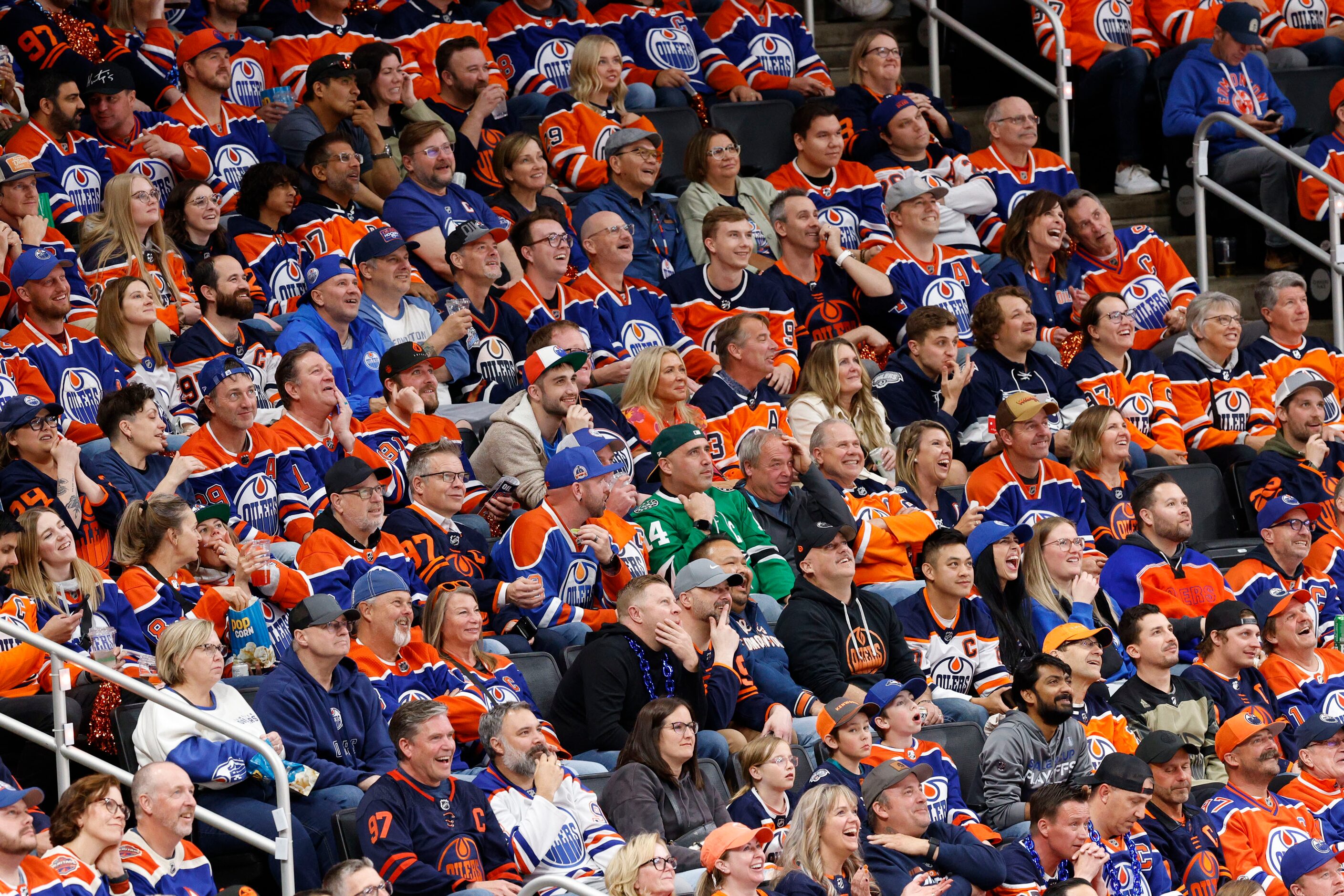 A Dallas Stars fan watches a game in the second period during Game 4 of the NHL hockey...