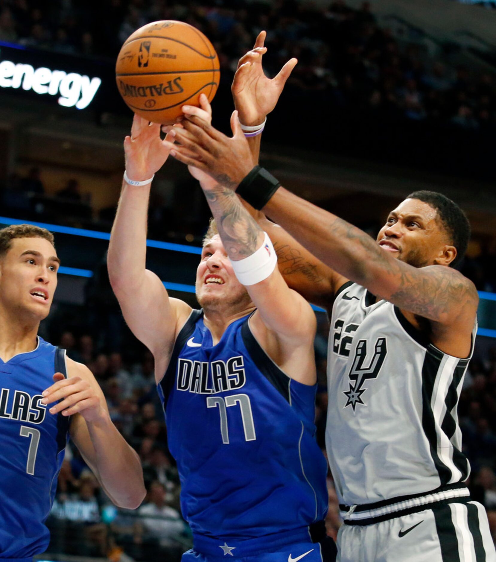 Dallas Mavericks forward Luka Doncic (77) drives the lane for a layup against San Antonio...