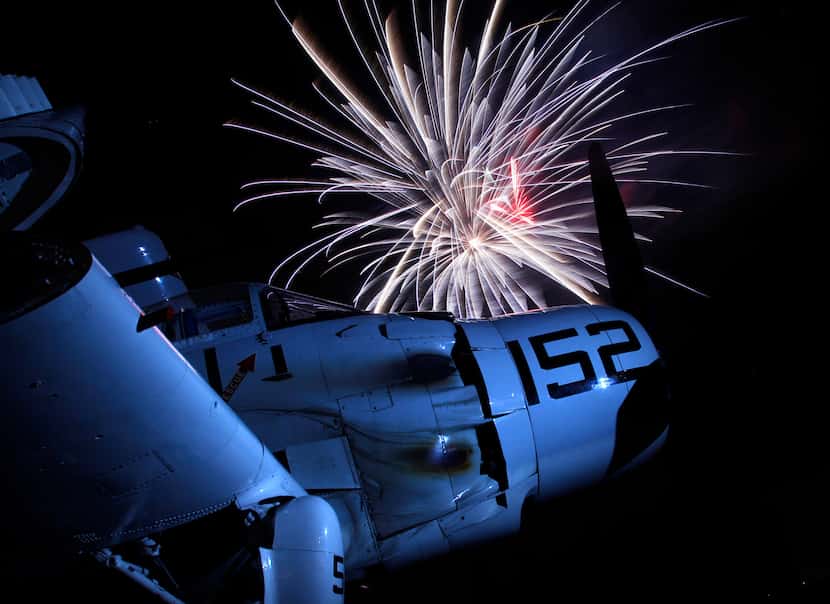 YOUR BOOMS ARE SO BOOMY ... An AD-5 Skyraider sits on the tarmac as Addison's Kaboom Town...