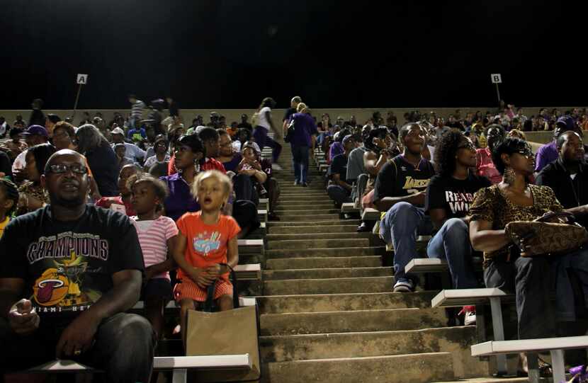 LBJ students and parents watch an LBJ-Reagan football game in Austin, Texas. According to...