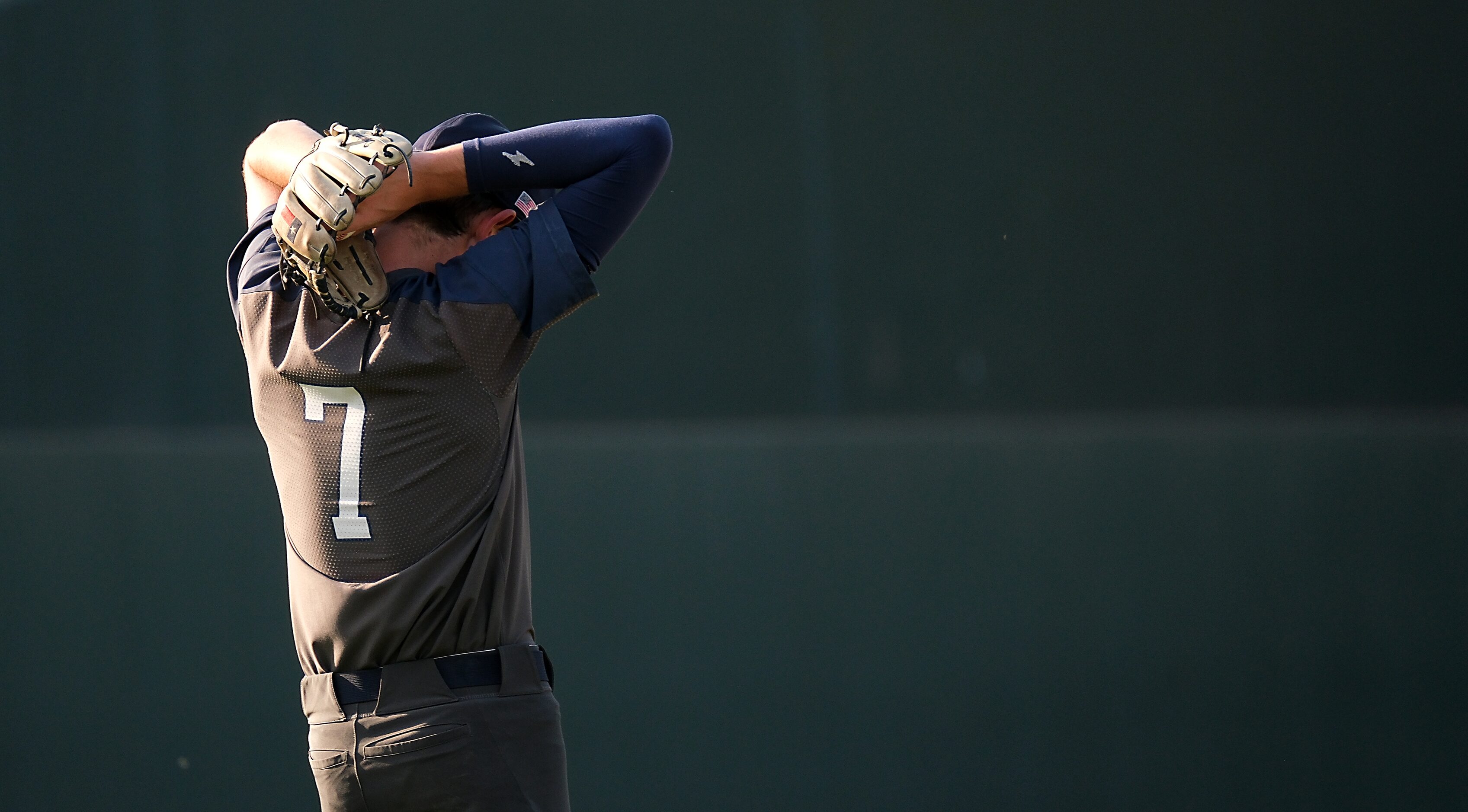 Flower Mound Zack James, (7), takes a moment before taking the mound against Cypress Woods...