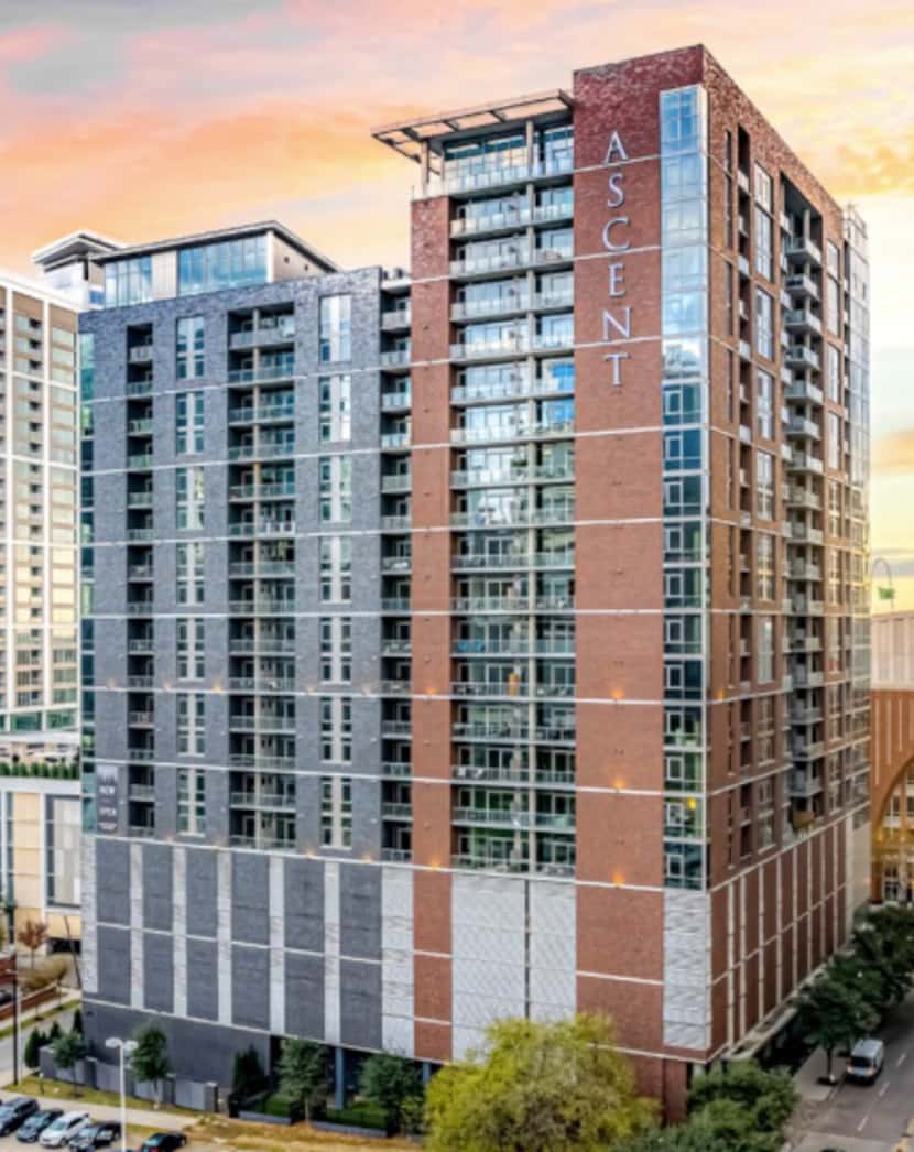The Ascent apartment tower is located next to the American Airlines Center in Victory Park.