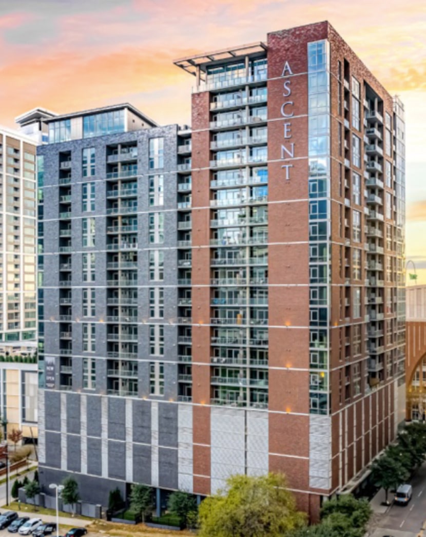 The Ascent apartment tower is located next to the American Airlines Center in Victory Park.