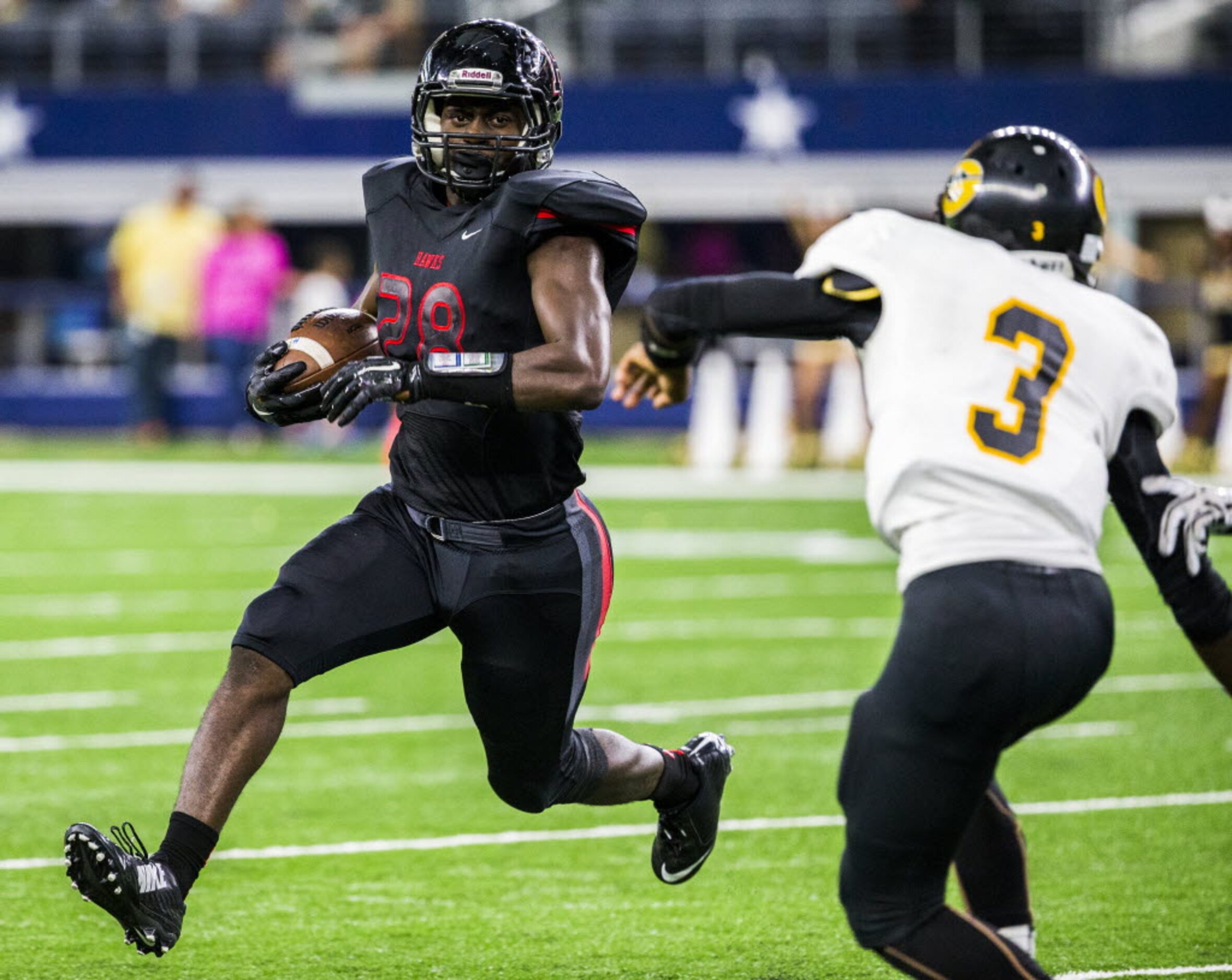 Garland defensive back Joshua Brown (3) threatens Rockwall-Heath's Tyler McCalister (28)...