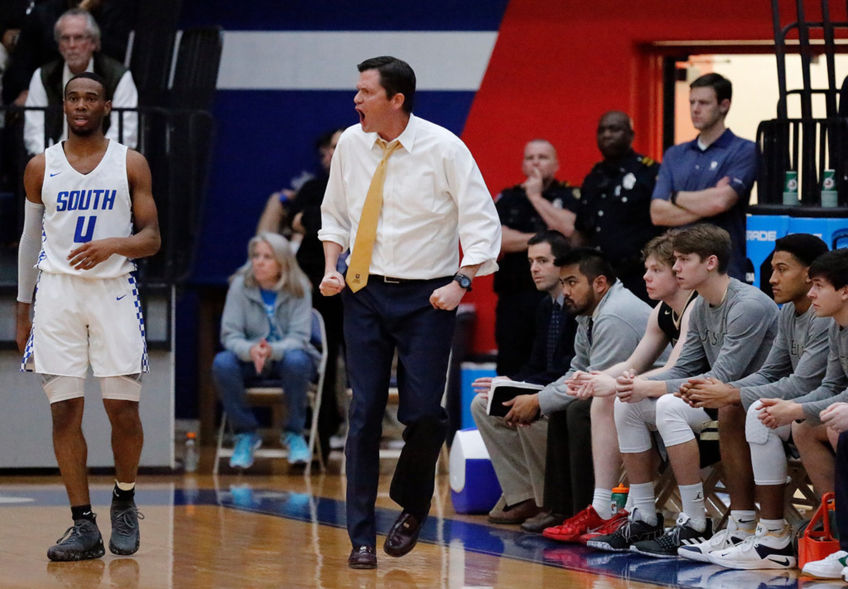 Dallas Jesuit head coach Chris Hill tries to inspire his team during the first half as South...