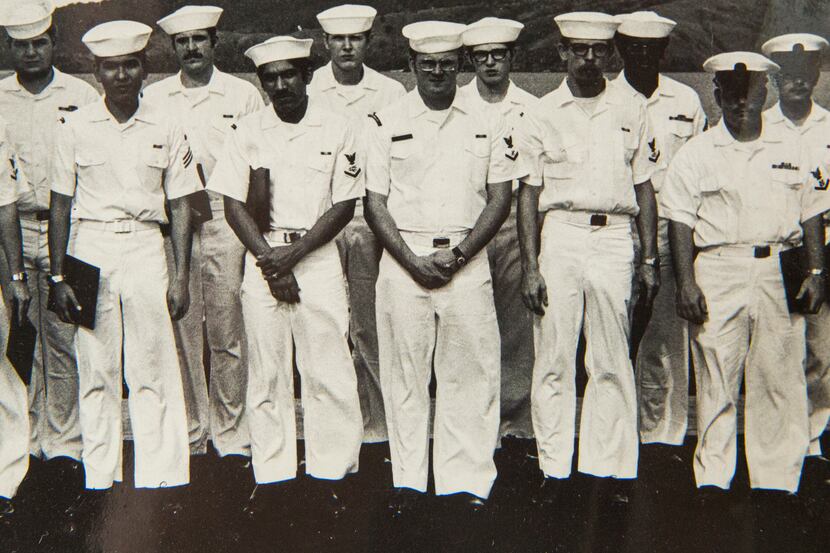Navy veteran Eddie Aguilar (front row, second from the left) and several of his fellow...