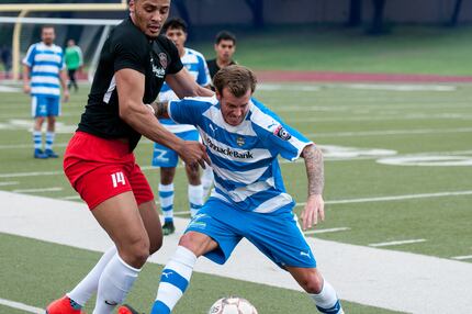 Vaqueros standout Jamie Lovegrove holds off a Tyler FC defender in the Vaqueros 3-0 win to...