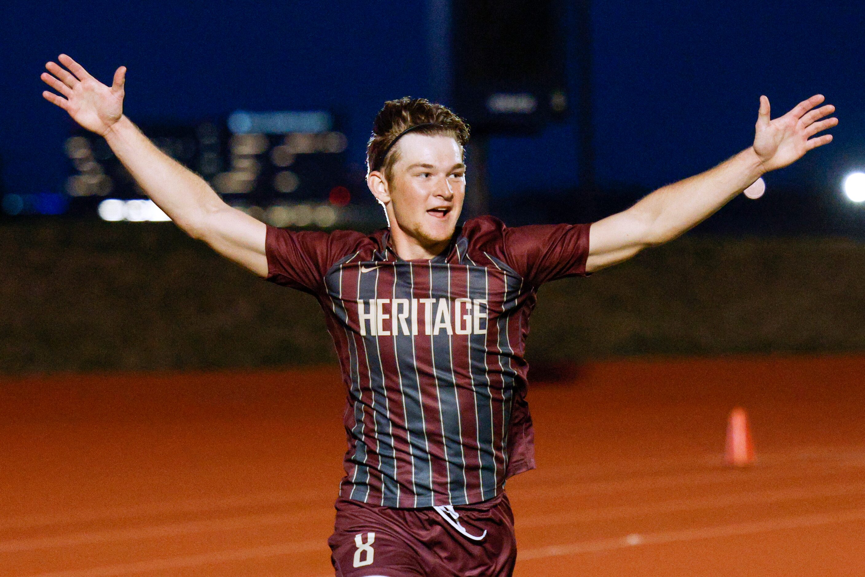 Frisco Heritage forward Jacob Culpepper (8) celebrate a goal during the first half of a...