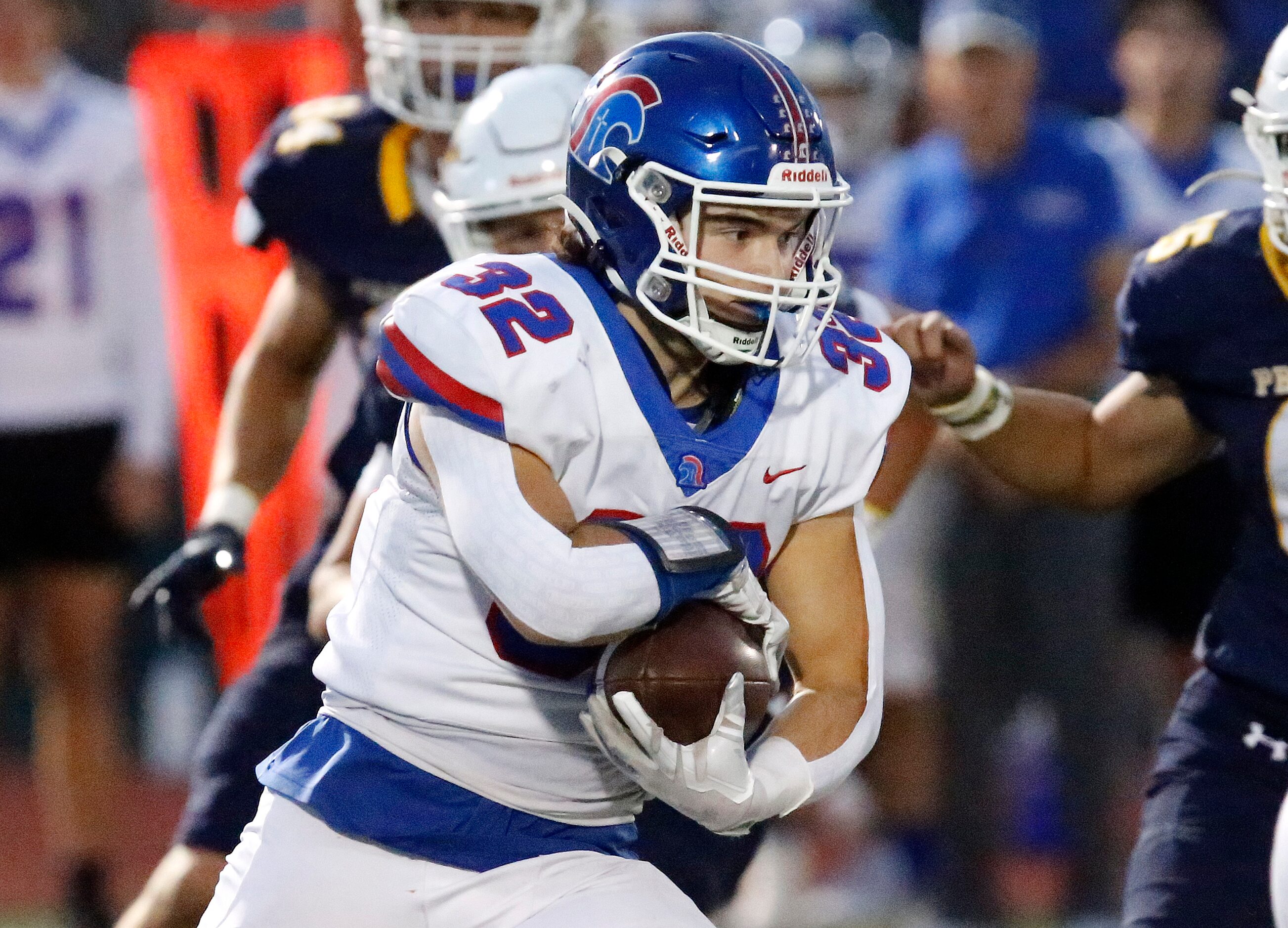 Trinity Christian Academy running back Jameson Dunigan (32) carries the ball during the...