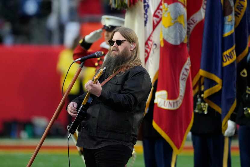 Chris Stapleton sings the national anthem before the NFL Super Bowl 57 football game between...