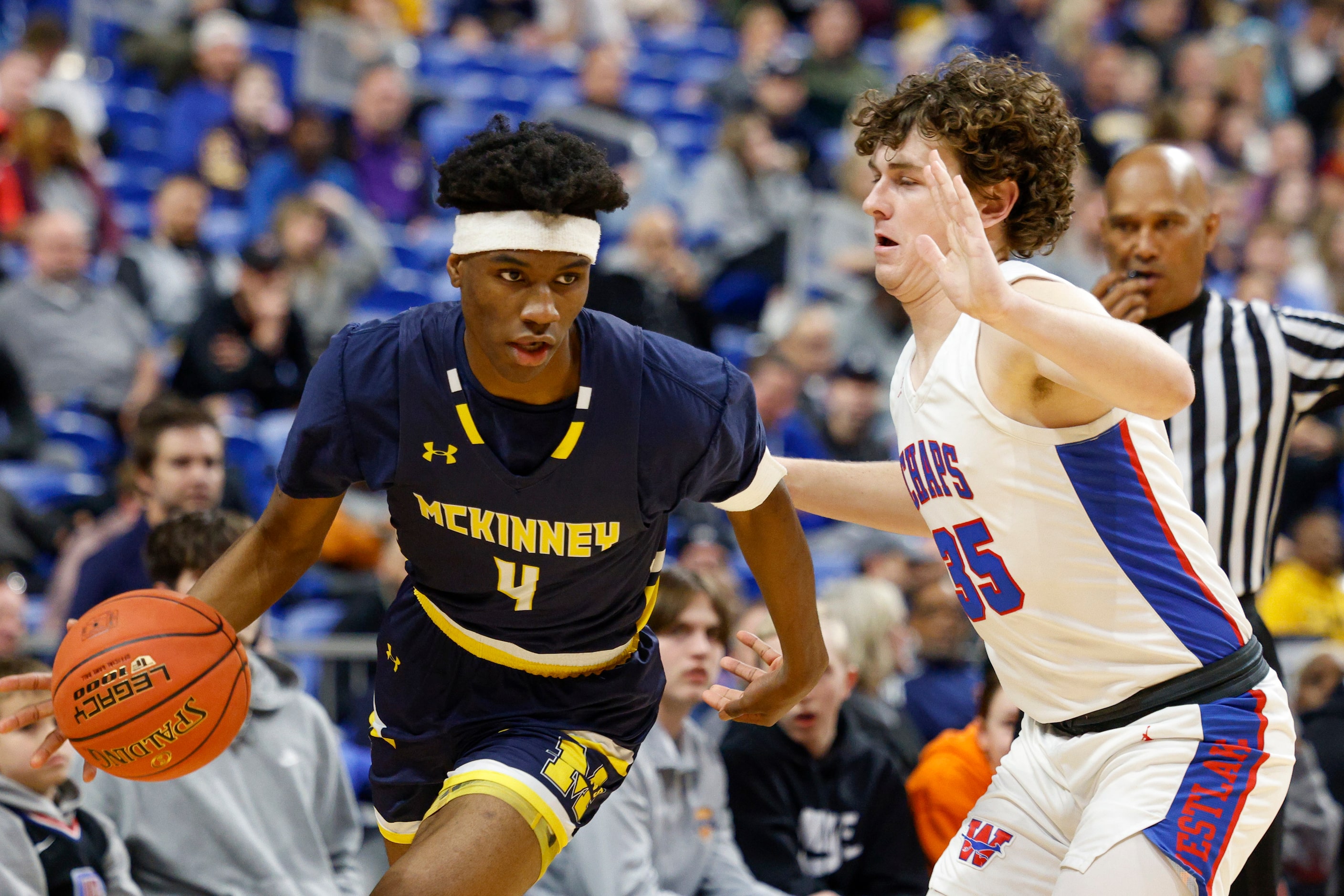 McKinney guard Ja'Kobe Walter (4) dribbles around Austin Westlake guard Conor McManus (35)...