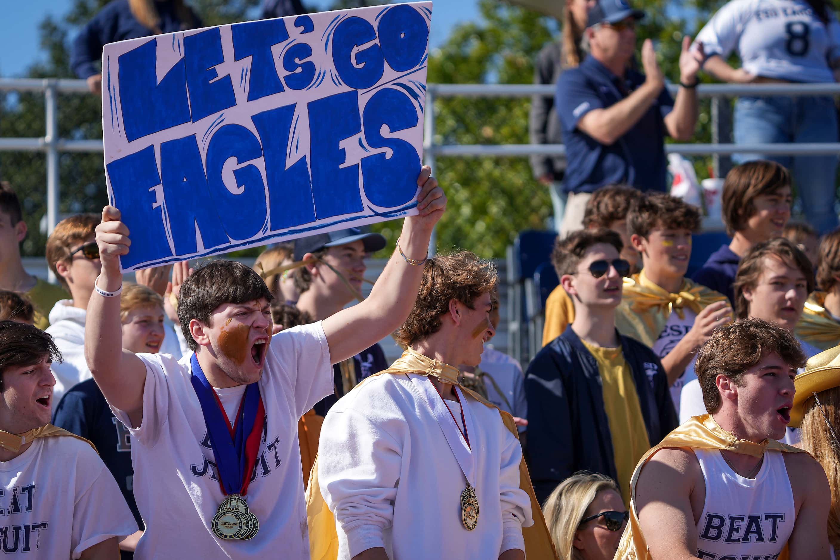 Episcopal School of Dallas students cheer on their team during the first half of the SPC 4A...