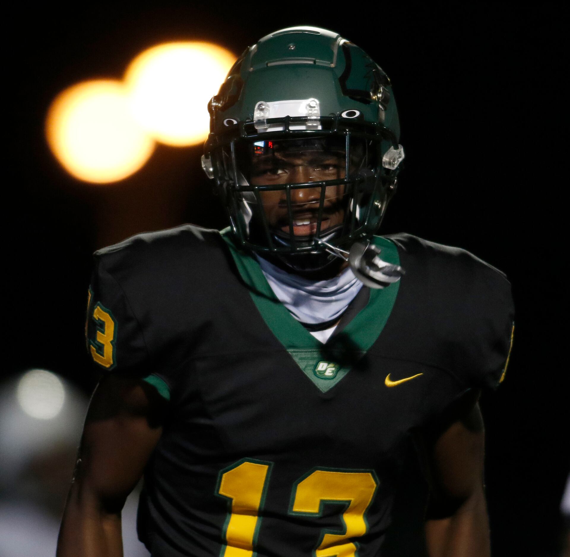 DeSoto receiver Johnny Cook ll (13) sports a smile after pulling in one of his first half...
