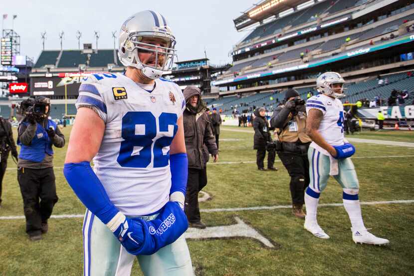 Dallas Cowboys tight end Jason Witten (82) and quarterback Dak Prescott (4) walk off the...