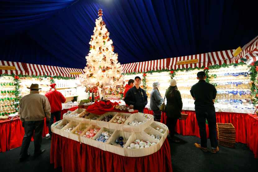 Grapevine High German Club students view some of the many Christmas ornaments at the KÃ¤the...