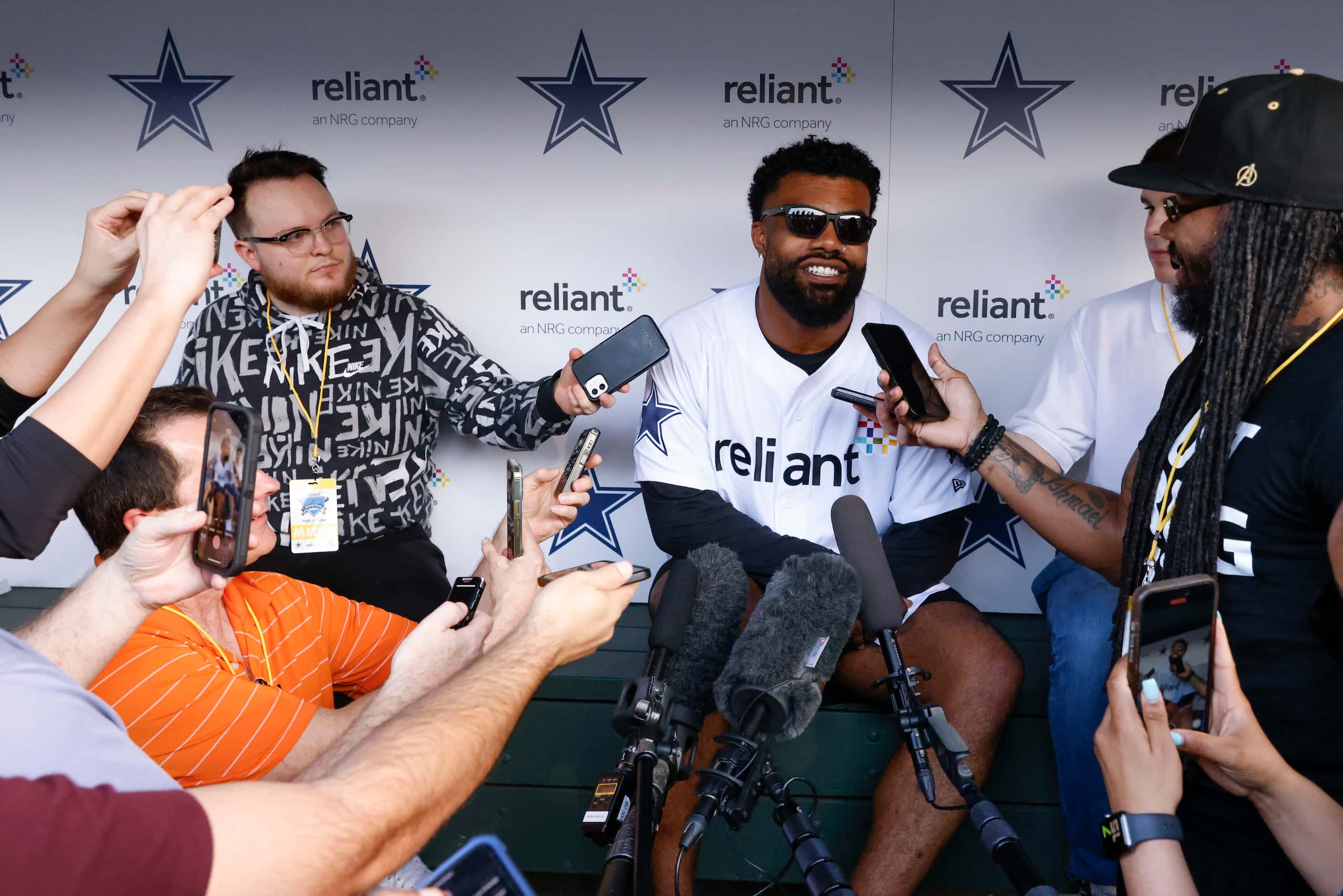 Dallas Cowboys running back Ezekiel Elliott talks to the members of the media during the...