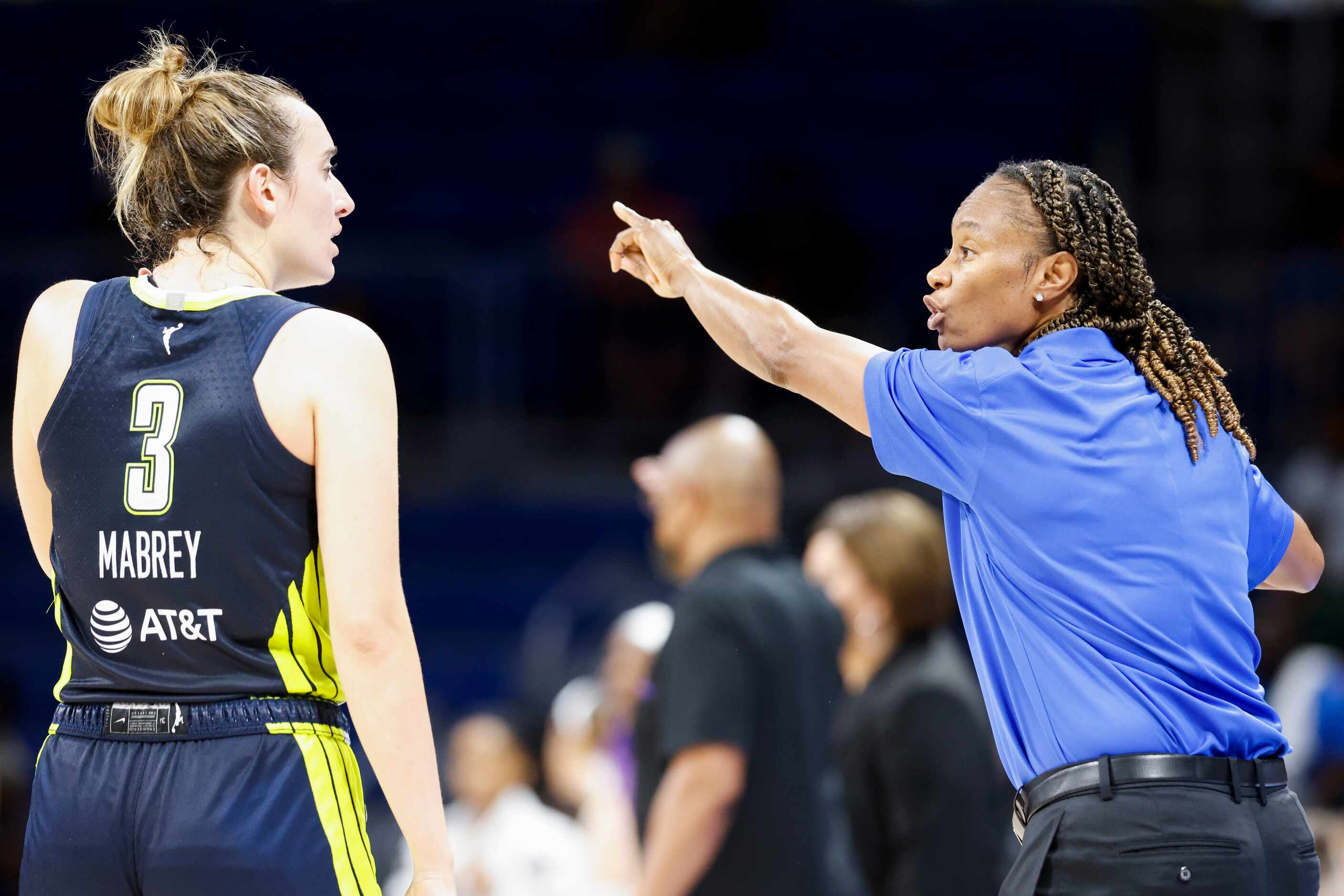 Dallas Wings head coach Vickie Johnson instructs Marina Mabrey (3) during the second half of...
