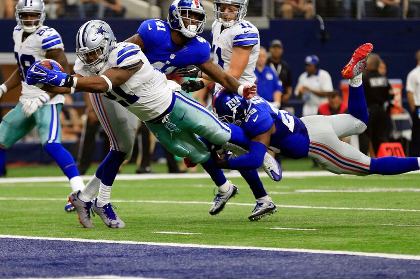 FILE - In this Sept. 11, 2016, file photo, Dallas Cowboys running back Ezekiel Elliott (21)...