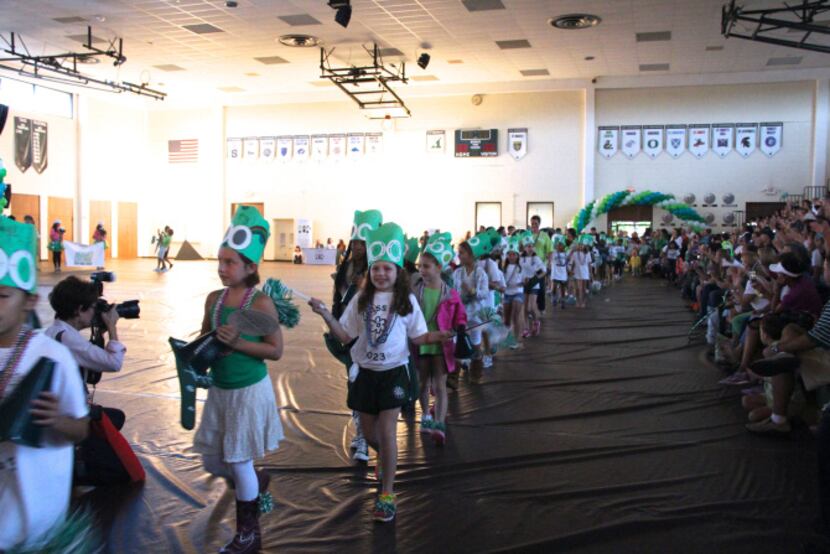 Girls paraded into the gym by grade level, each with a different theme.