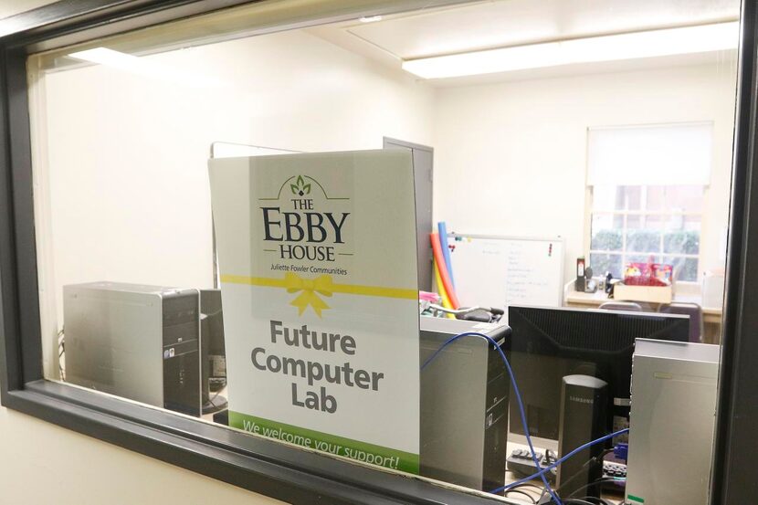 
A sign reading “Future Computer Lab” sits in a window at the Ebby House.
