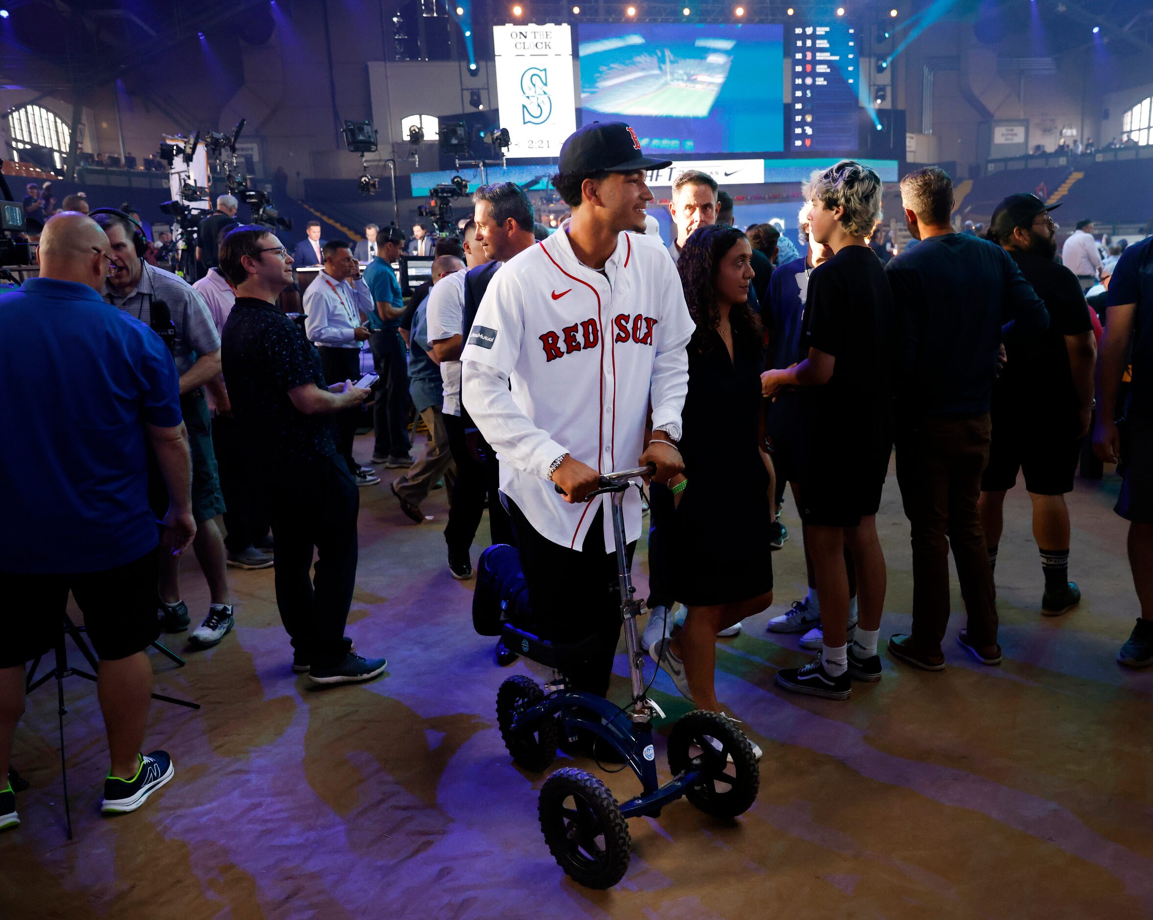 Braden Montgomery, a right fielder from Texas A&M, wheel through the crowd after being...