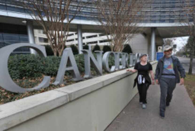Marni and Jeffrey Weiss walk to lunch between February doctors' appointments. (Louis...