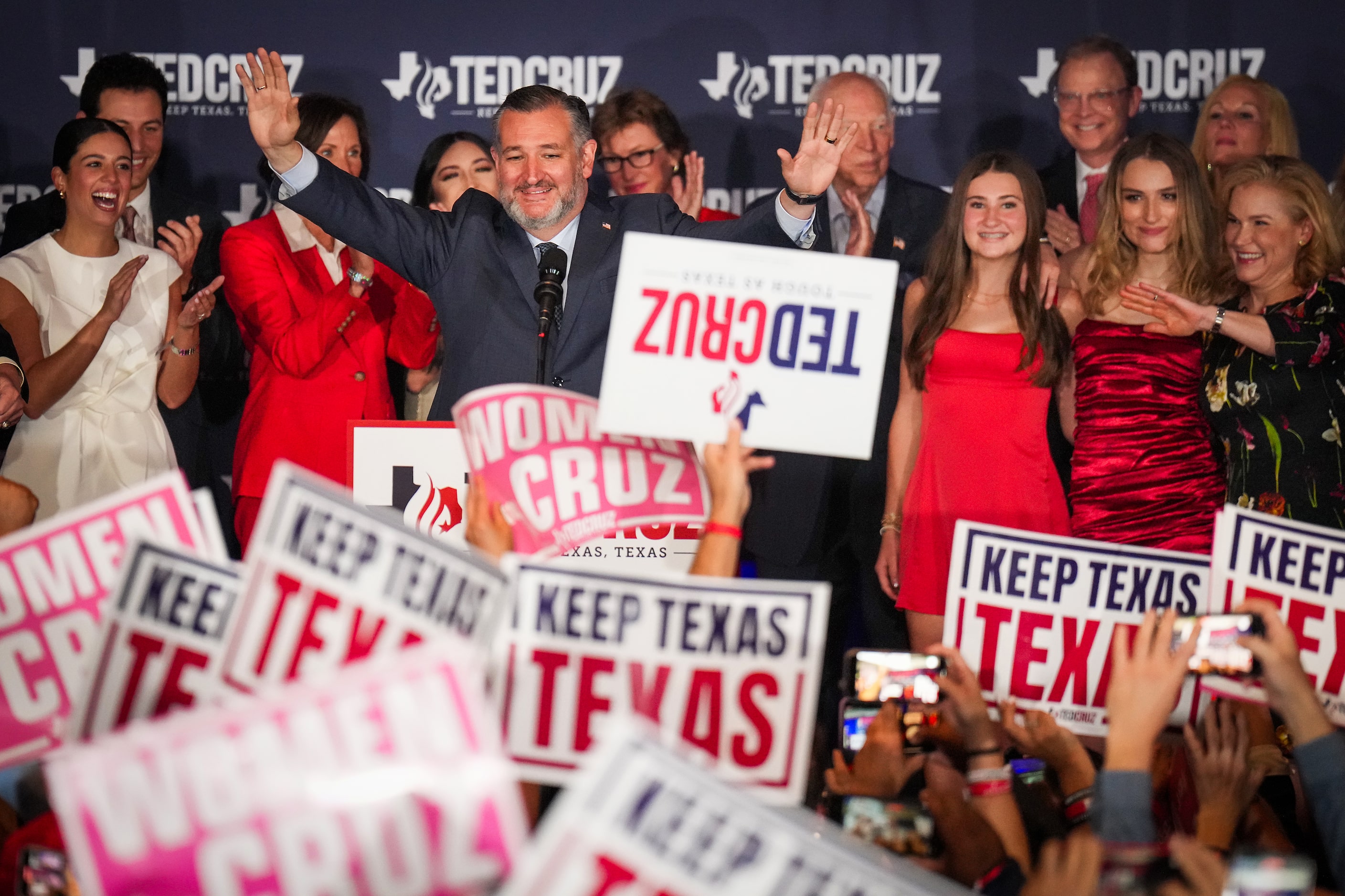 Sen. Ted Cruz, R-Texas, waves to supporters as he takes the stage to declare victory over...