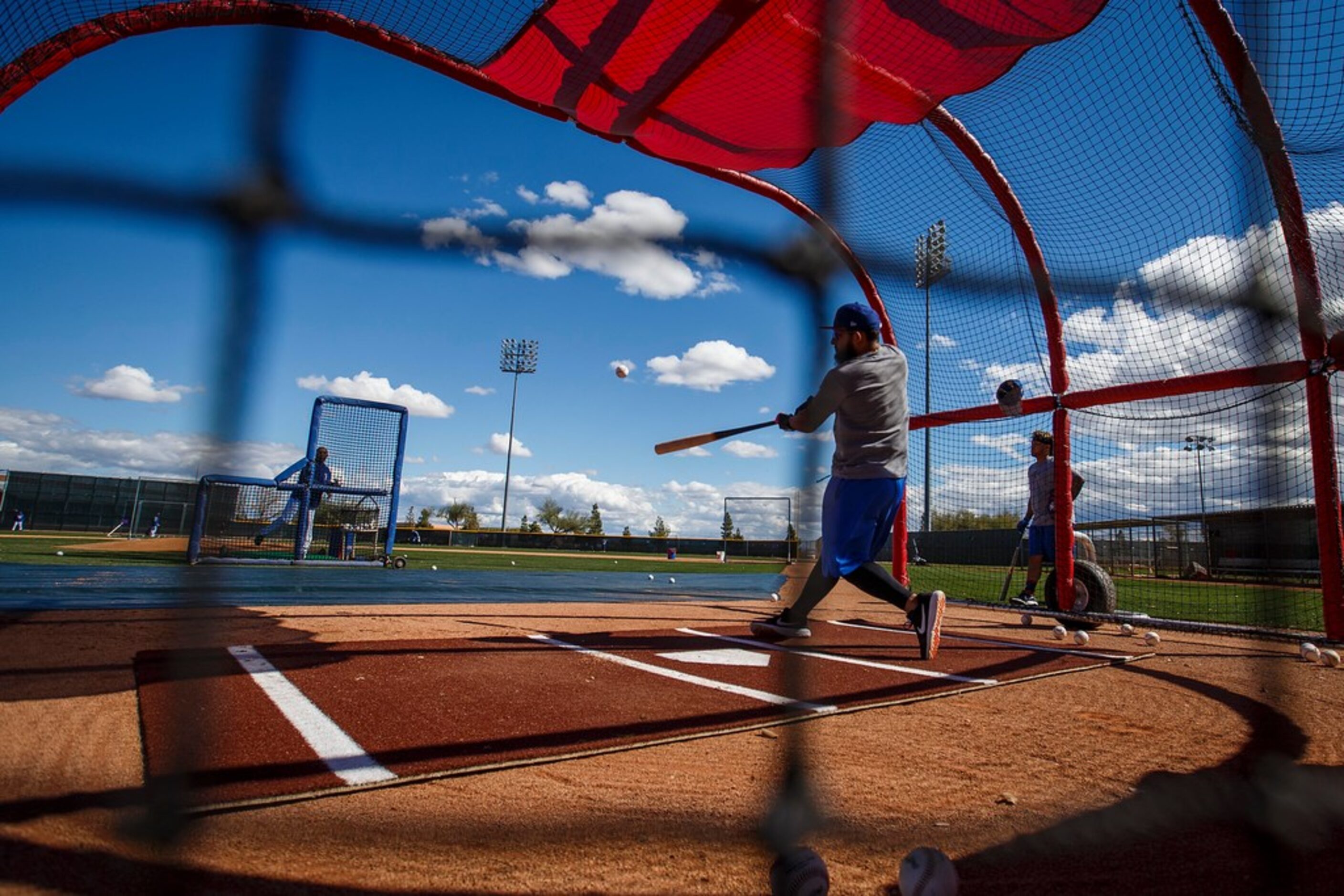 Texas Rangers infielder Rougned Odor takes batting practice during a spring training workout...