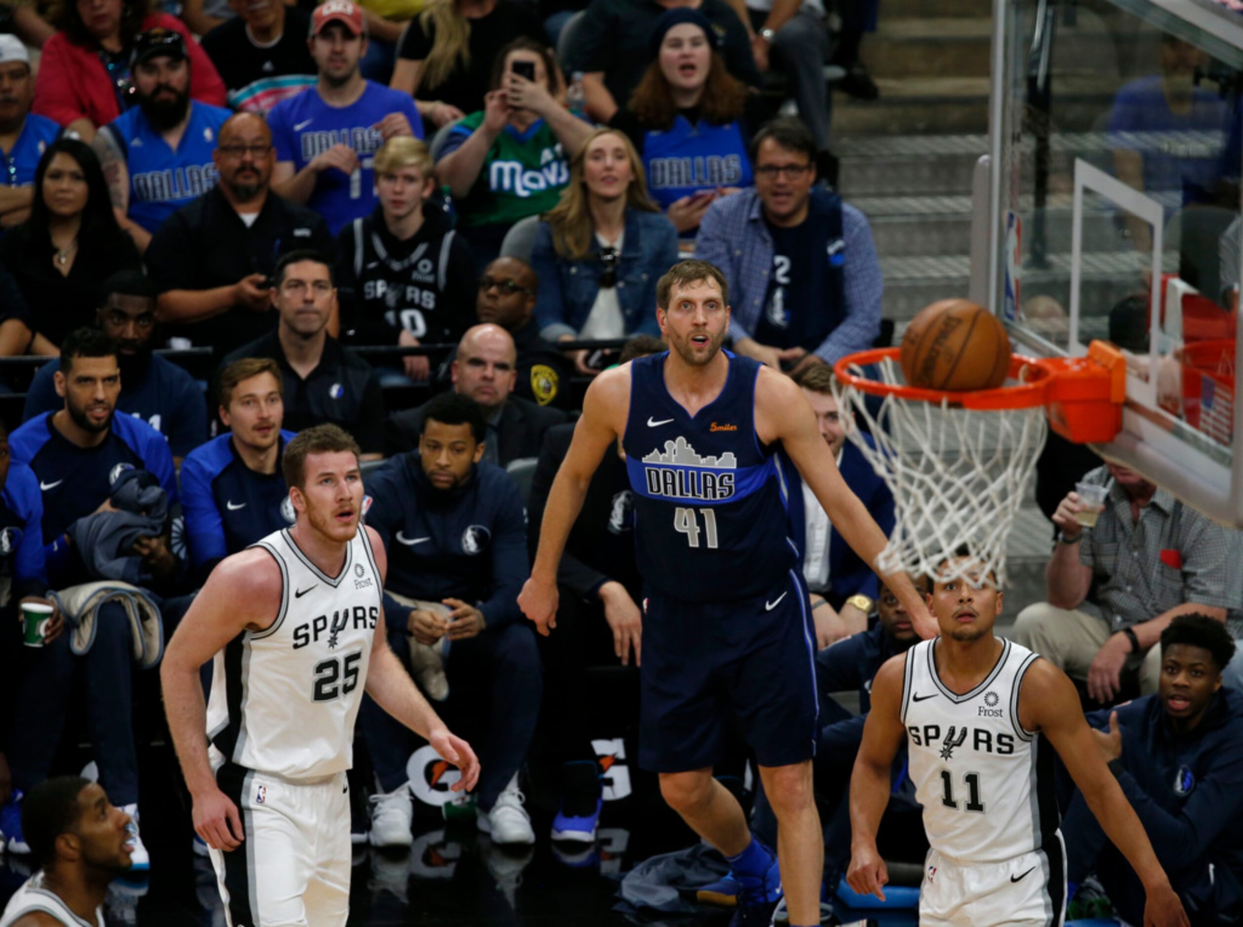 Dallas Mavericks forward Dirk Nowitzki (41) watches his shot as San Antonio Spurs center...