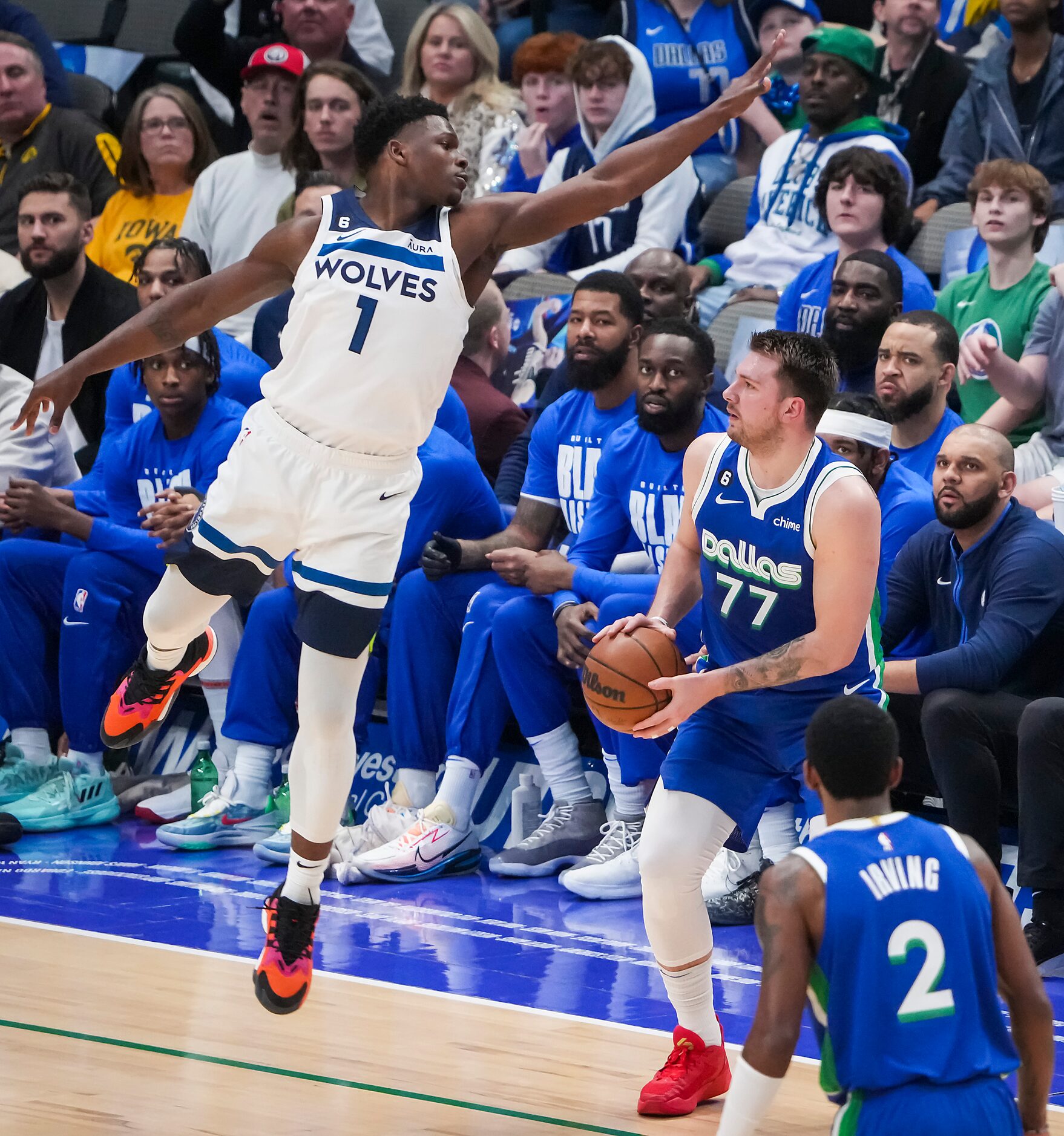 A pump fake by Dallas Mavericks guard Luka Doncic (77) gets Minnesota Timberwolves guard...