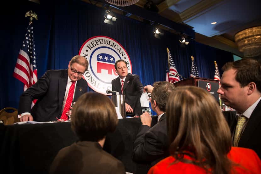 John Ryder, left, the Republican National Committee's general counsel, and Reince Priebus,...
