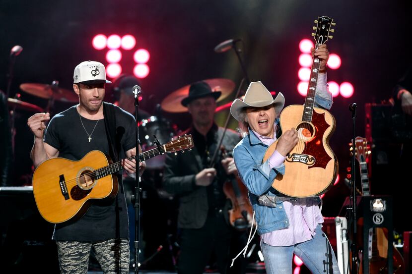 Sam Hunt, left, and Dwight Yoakam perform at ACM Presents Superstar Duets at Globe Life Park...