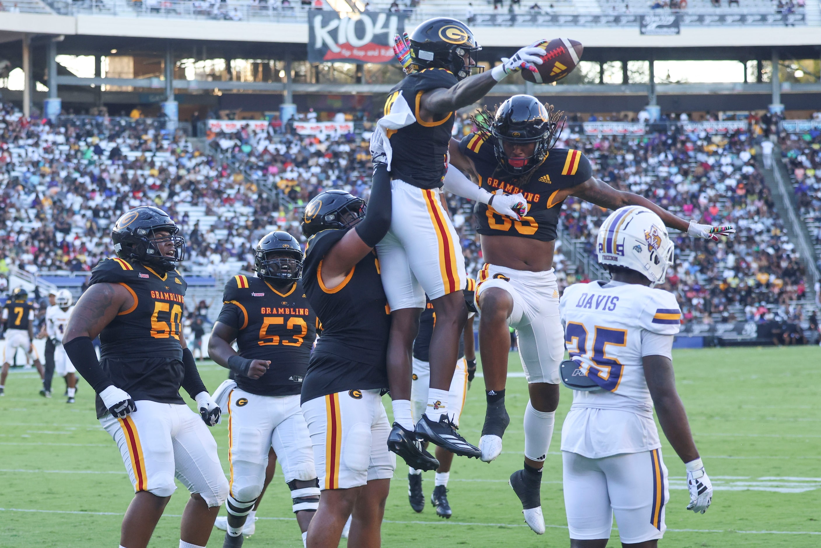 Grambling State players celebrate a touchdown during the first half of State Fair Classic...